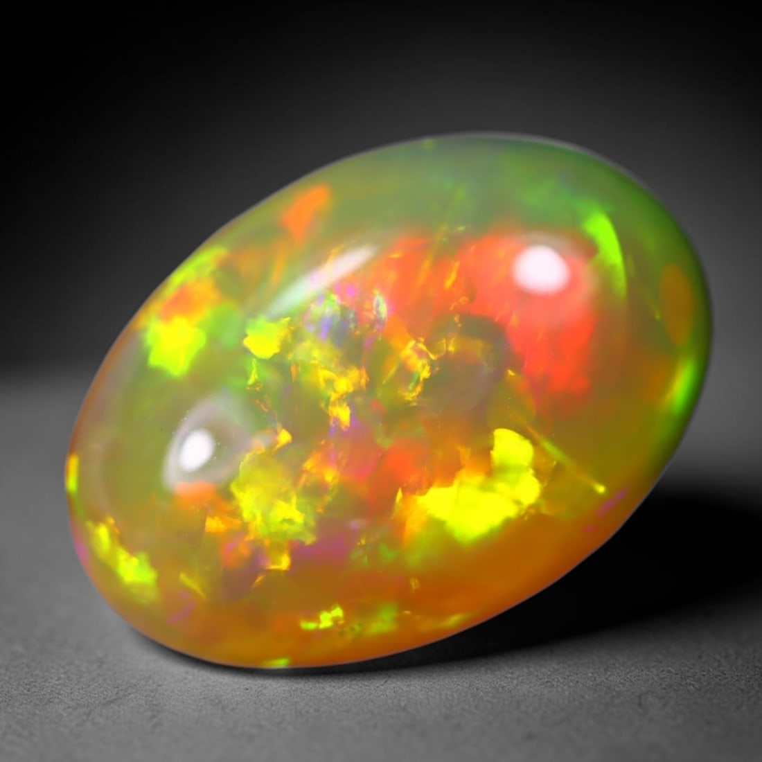 *6.67Ct Welo Opal Polished - Ethiopian Opal - Oval Cabochon, 337B: Ksmith Heritage Auctioneers Subject: Natural Ethiopian Welo Opal Origin: Ethiopia Carat Weight: 6.67Ct Dimension: 16.9 x 11.7 x 6.1 mm Treatment: Natural Untreated Shape: Oval