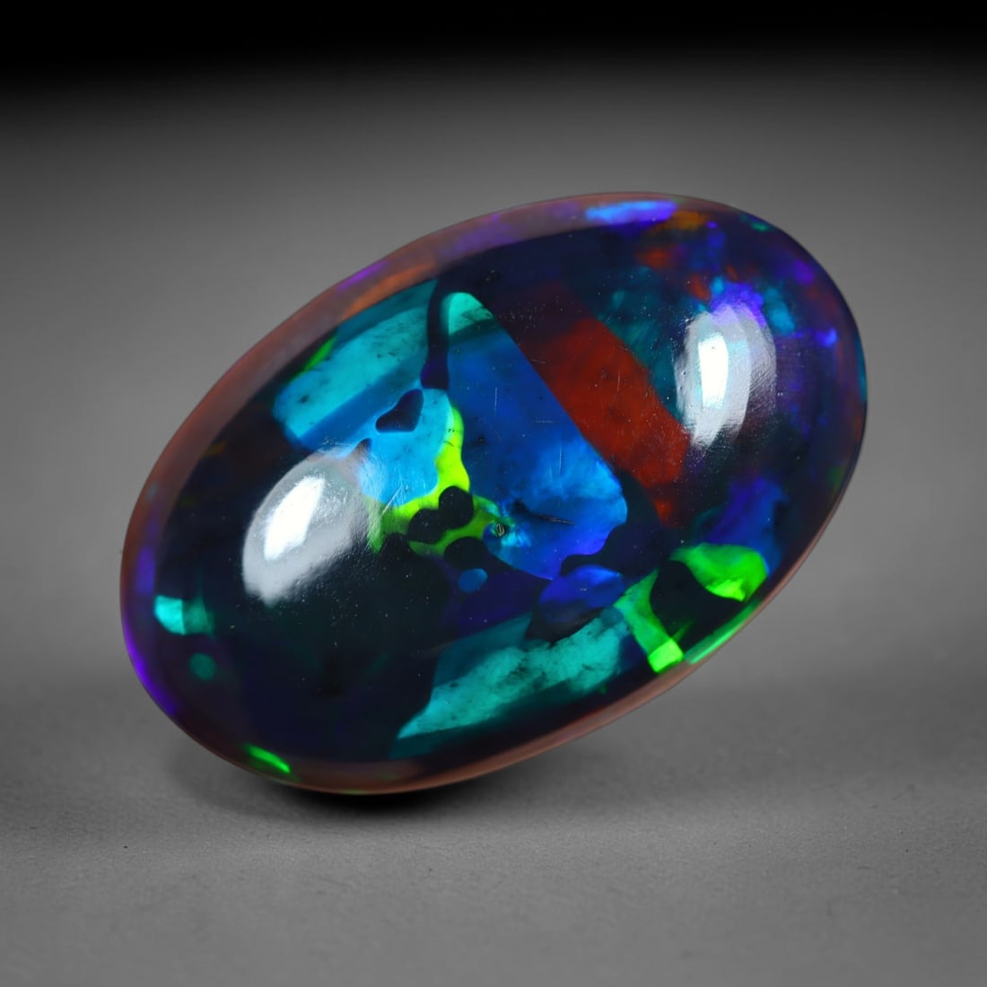 2.98Ct Natural Ethiopian Black Opal - 14.5x9.5x4.3 mm , 805C: Ksmith Heritage Auctioneers Subject: Natural Ethiopian Welo Opal Origin: Ethiopia Treatment: Smoked