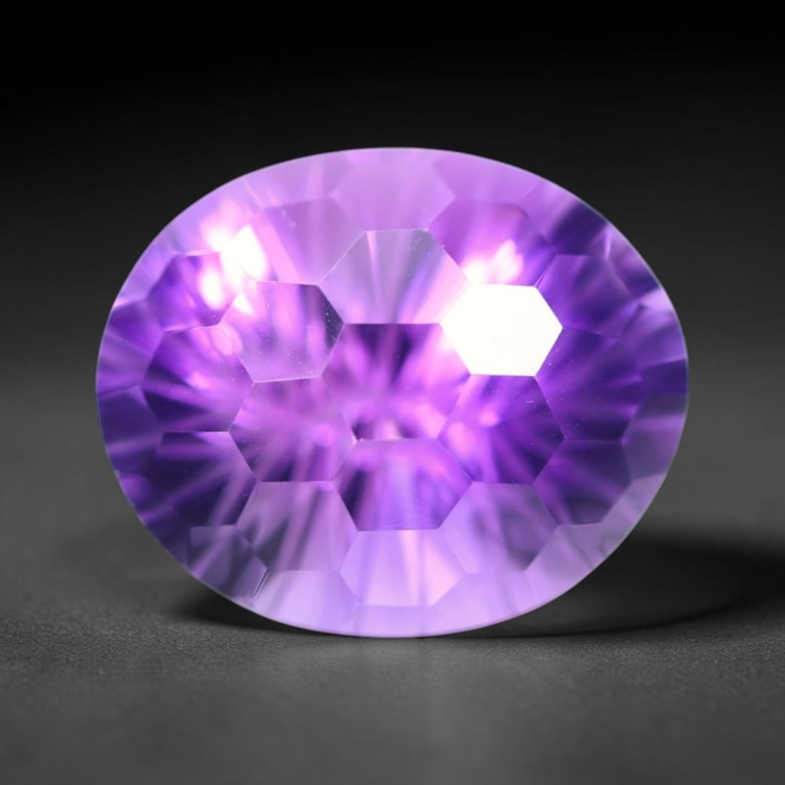 19.49Ct Purple Amethyst - Polished Faceted , 761E: Ksmith Heritage Auctioneers Subject: Natural Amethyst Origin: Brazil Carat Weight: 19.49Ct Dimension: 19.4x15.9x17.8 mm Treatment: Untreated Type: Faceted, Polished