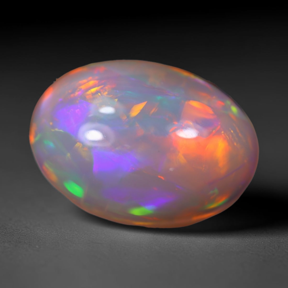 *5.47Ct Welo Opal Polished - Ethiopian Opal, 528B: Ksmith Heritage Auctioneers Subject: Natural Ethiopian Welo Opal Origin: Ethiopia Carat Weight: 5.47Ct Dimension: 15.7x11.4x6.3 mm Treatment: Natural Untreated Type: Cabochon,