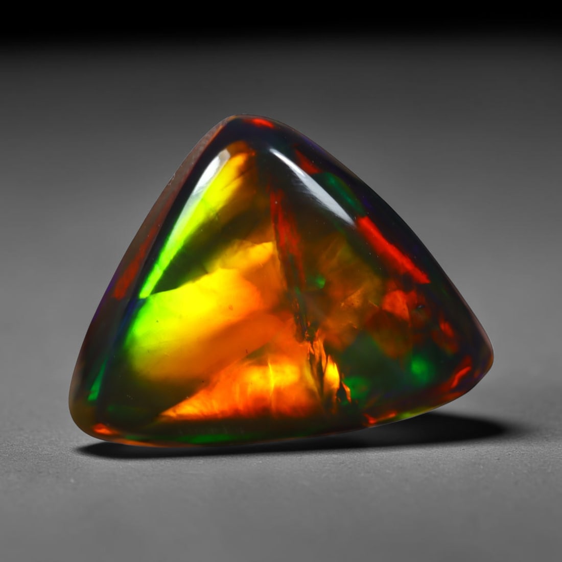 3.52Ct Natural Ethiopian Black Opal - 15.5x12.8x3.7 mm , 820C: Ksmith Heritage Auctioneers Subject: Natural Ethiopian Welo Opal Origin: Ethiopia Treatment: Smoked