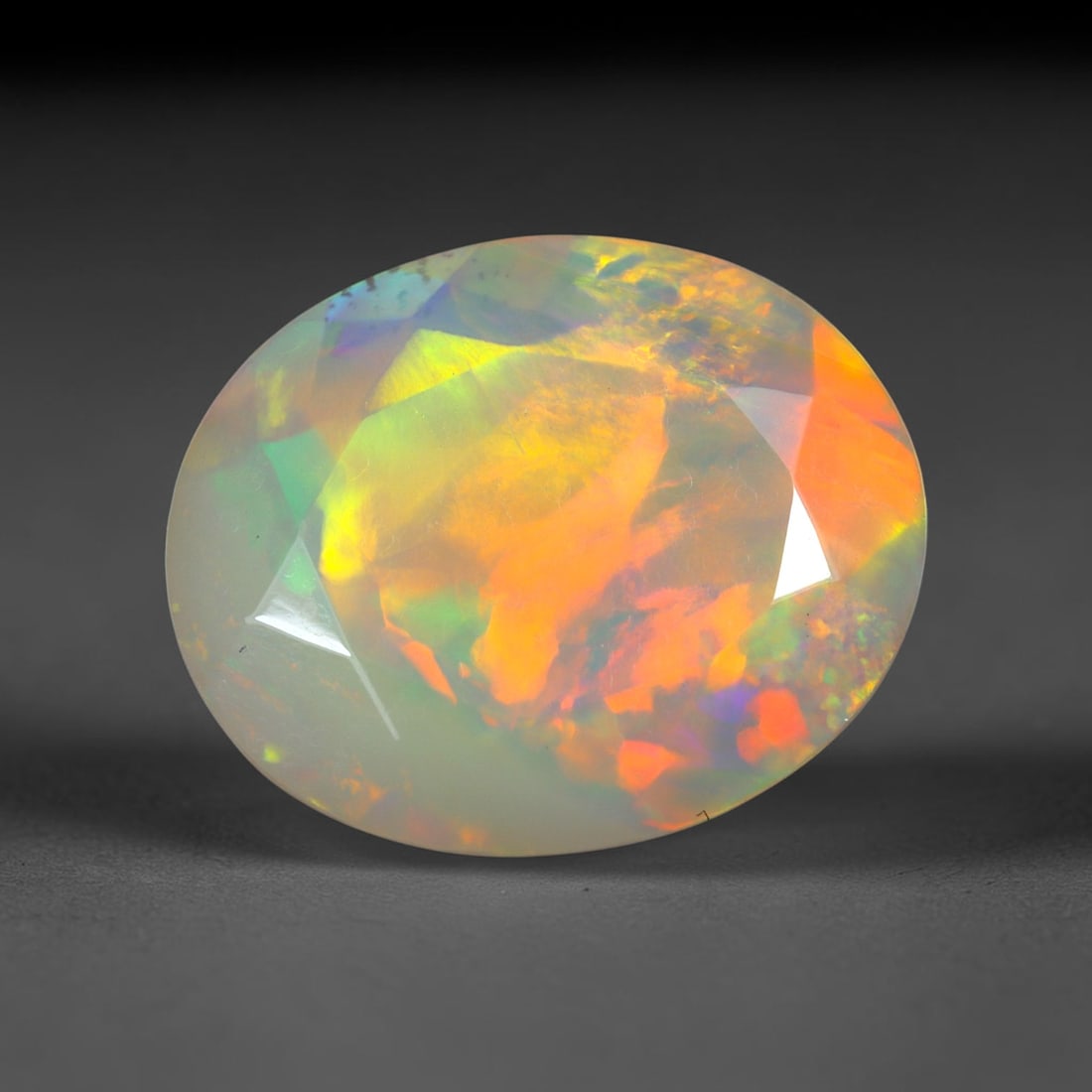 2.68Ct Natural Ethiopian Opal, Faceted Cut - 12.0x10.0x5.4 mm , 655C: Ksmith Heritage Auctioneers Subject: Natural Ethiopian Welo Opal Origin: Ethiopia Treatment: Unheated