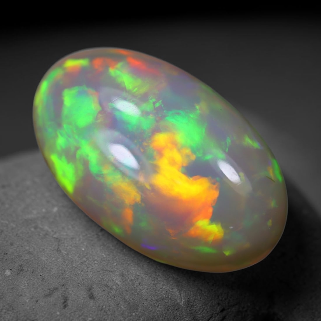 *10.95Ct Welo Opal Polished - Ethiopian Opal, 1105B: Ksmith Heritage Auctioneers Subject: Natural Ethiopian Welo Opal Origin: Ethiopia Carat Weight: 10.95Ct Dimension: 20.3x12.4x9.4 mm Treatment: Natural Untreated Type: Cabochon,