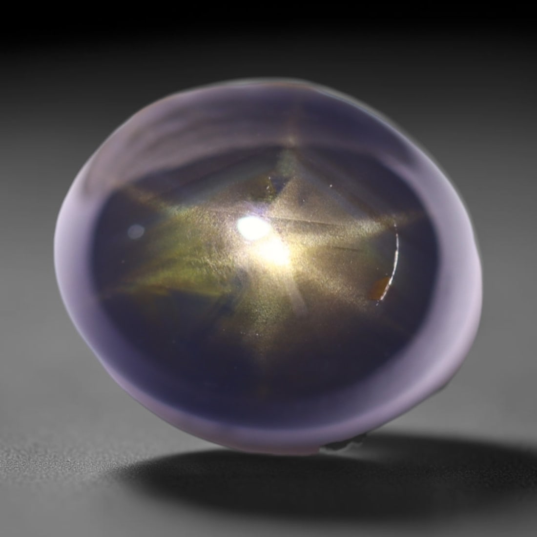 4.72cts 6 Rays Black Star Sapphire , 718E: Ksmith Heritage Auctioneers Subject: Natural 6 Rays Star Sapphire Origin: Myanmar Carat Weight: 4.72cts Dimension: 9.6x7.9x5.4 mm Treatment: Diffusion Type: Cabochon, Poli