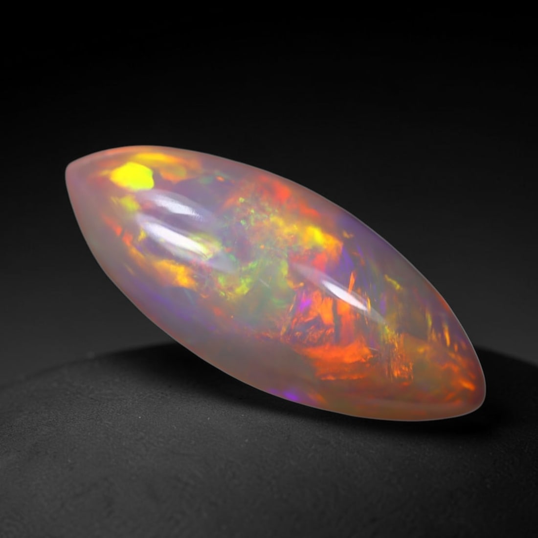 *4.92Ct Welo Opal Polished - Ethiopian Opal, 600B: Ksmith Heritage Auctioneers Subject: Natural Ethiopian Welo Opal Origin: Ethiopia Carat Weight: 4.92Ct Dimension: 20.7x8.7x6.3 mm Treatment: Natural Untreated Type: Cabochon, P