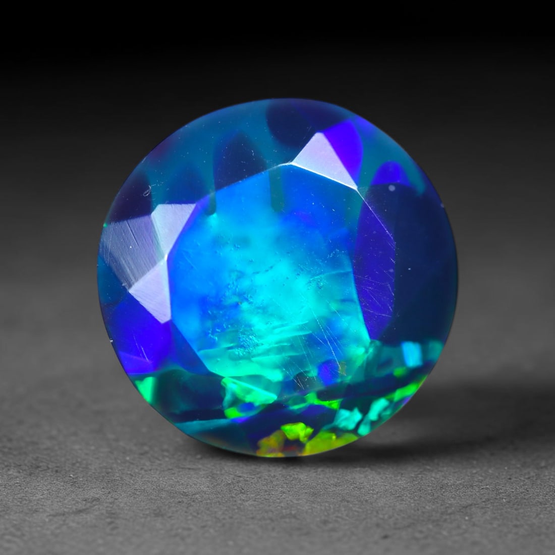 2.95Ct Natural Smoked Ethiopian Black Opal, Faceted Cut - 10.8x10.8x6.5 mm , 707C: Ksmith Heritage Auctioneers Subject: Natural Ethiopian Welo Opal Origin: Ethiopia Treatment: Smoked