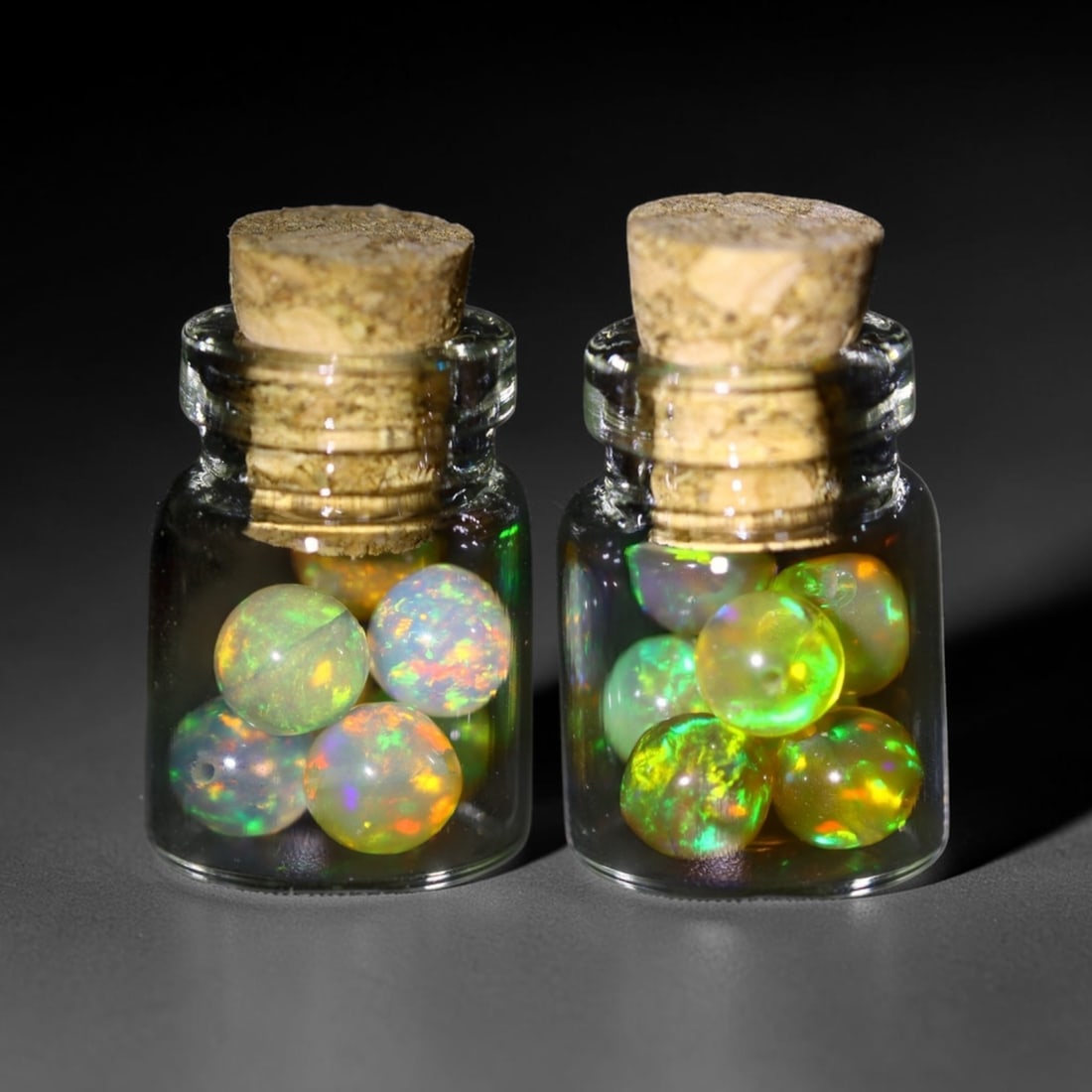 Twin Pack - 4.5mm Ethiopian Opal Ball in Display Jar - Bottle Size 1.5cm , 79C: Ksmith Heritage AuctioneersSubject: Natural Opal (with bottle) Origin: Ethiopia Treatment: Unheated