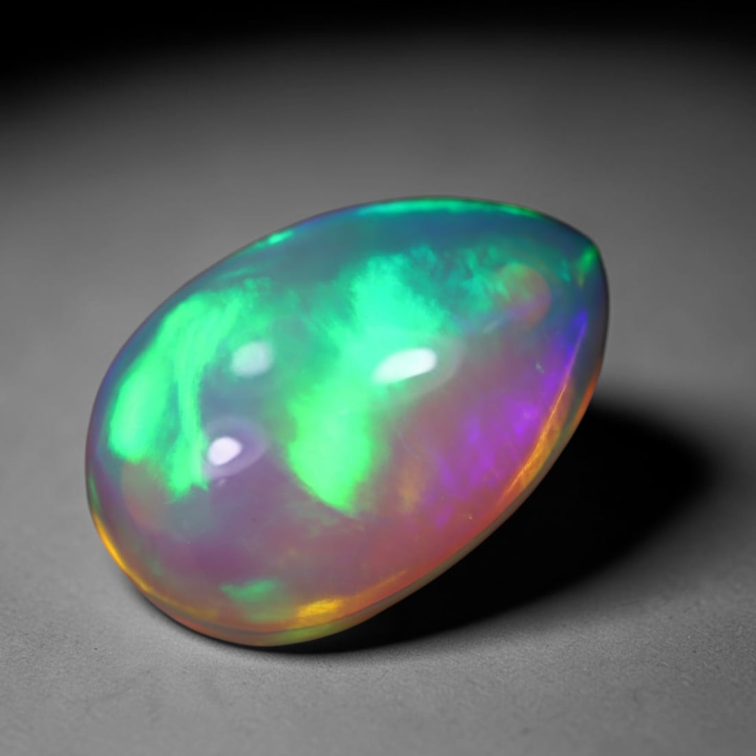 *4.98Ct Welo Opal Polished - Ethiopian Opal - Pear Cabochon, 764B: Ksmith Heritage Auctioneers Subject: Natural Ethiopian Welo Opal Origin: Ethiopia Carat Weight: 4.98Ct Dimension: 15.1 x 10.1 x 5.9 mm Treatment: Natural Untreated Shape: Pear