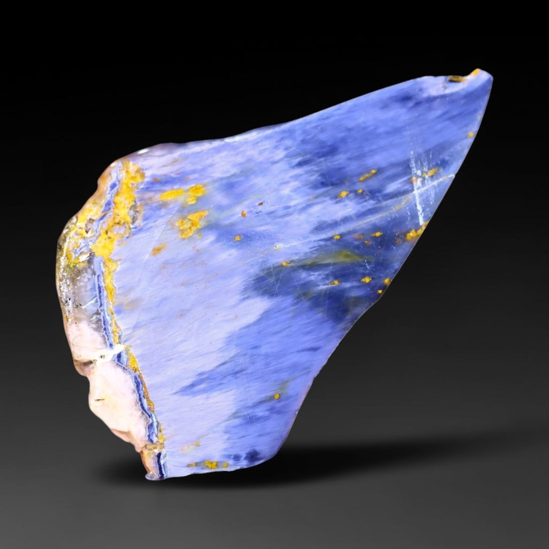 22.21Ct Pietersite Slab - Gemstone Crystal - Freeform Slice, 1046B: Ksmith Heritage Auctioneers Subject: Natural Pietersite Origin: Namibia, South Africa Carat Weight: 22.21Ct Dimension: 40.1 x 25.1 x 4 mm Treatment: Natural Untreated Shape: Fr