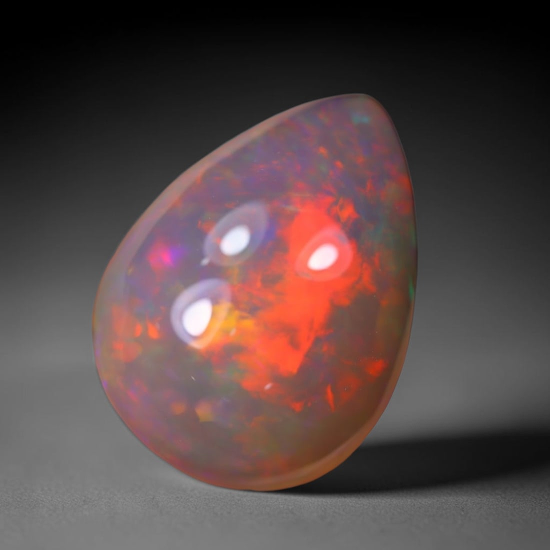 *6.46Ct Welo Opal Polished - Ethiopian Opal, 204B: Ksmith Heritage Auctioneers Subject: Natural Ethiopian Welo Opal Origin: Ethiopia Carat Weight: 6.46Ct Dimension: 16.2x12.1x6.8 mm Treatment: Natural Untreated Type: Cabochon,
