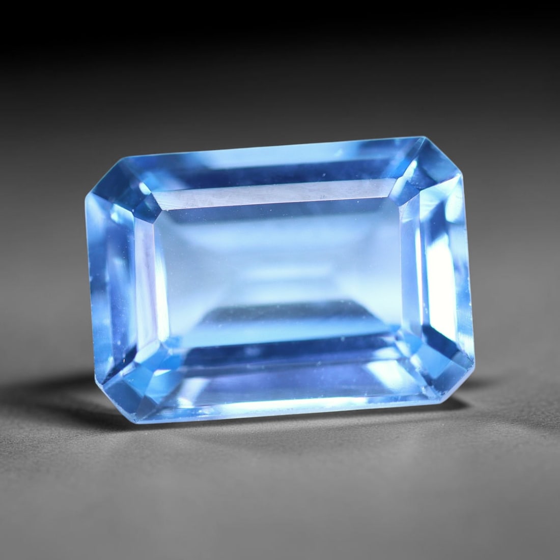 9.24 carats Natural Swiss Blue Topaz - 14x10x6.5mm , 836C: Ksmith Heritage Auctioneers Subject: Natural Topaz Treatment: Irradiated Type: Faceted, Polished