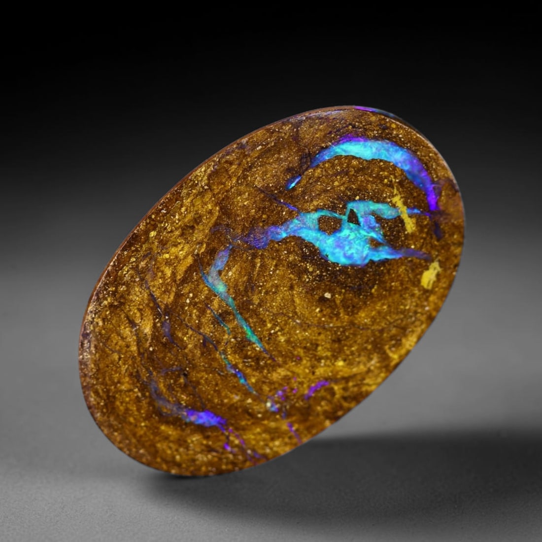 *9.19Ct Boulder Opal - Australian Opal , 195C: Ksmith Heritage Auctioneers Subject: Natural Boulder Opal Origin: Australia Carat Weight: 9.19Ct Dimension: 19.6x12.8x3.9 mm Treatment: Natural Untreated Type: Cabochon, P