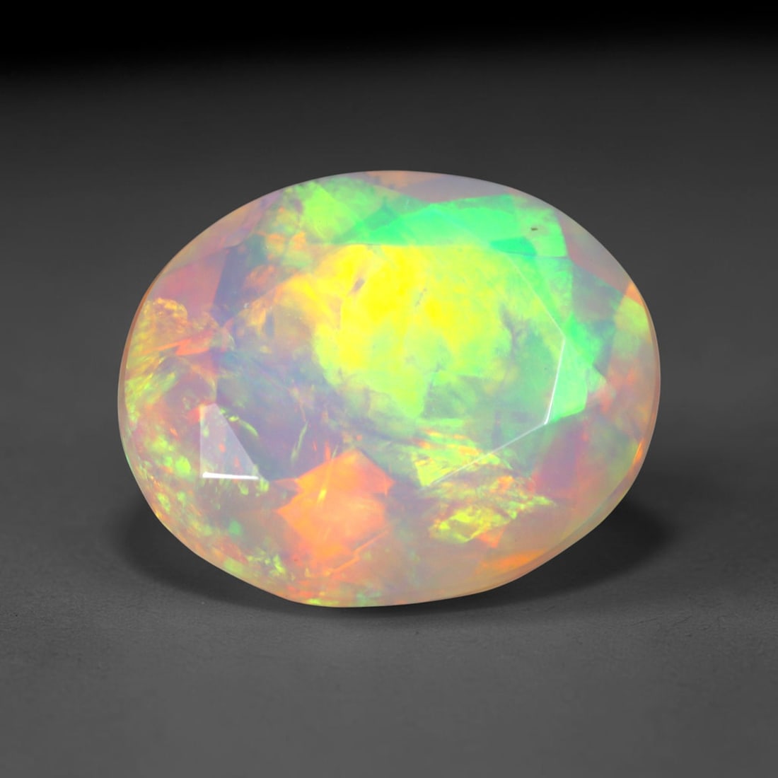3.04Ct Natural Ethiopian Opal, Faceted Cut - 11.9x9.9x6.3 mm , 676C: Ksmith Heritage Auctioneers Subject: Natural Ethiopian Welo Opal Origin: Ethiopia Treatment: Unheated