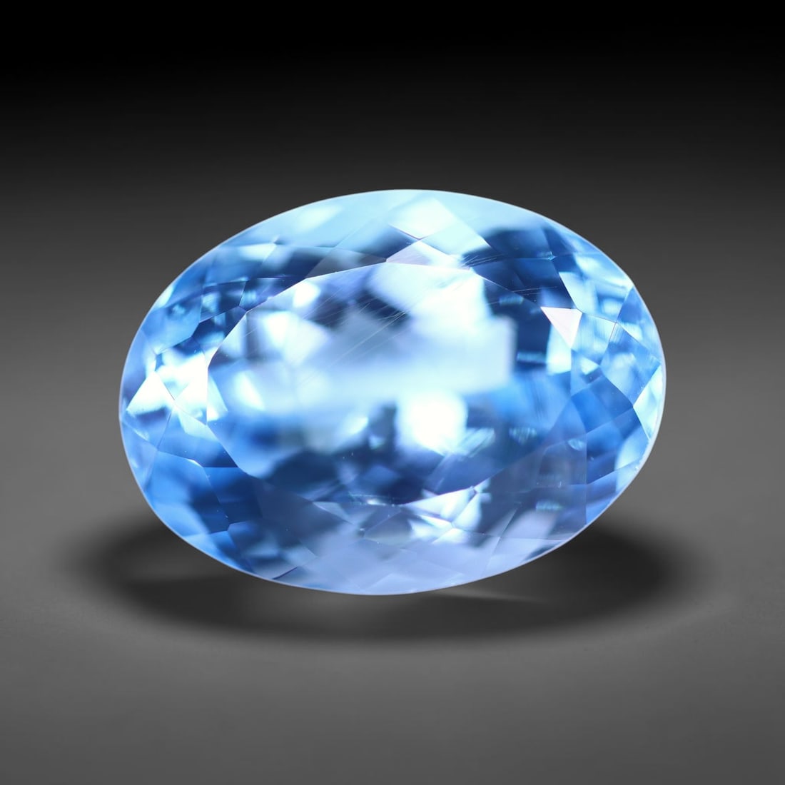 17.03 carats Natural Swiss Blue Topaz - 17.6x13.0x9.6mm , 849C: Ksmith Heritage Auctioneers Subject: Natural Topaz Treatment: Irradiated Type: Faceted, Polished