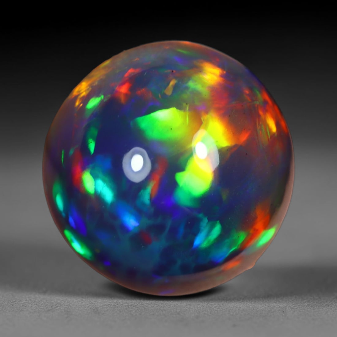 3.02Ct Natural Ethiopian Black Opal - 10.2x10.1x6.0 mm , 812C: Ksmith Heritage Auctioneers Subject: Natural Ethiopian Welo Opal Origin: Ethiopia Treatment: Smoked