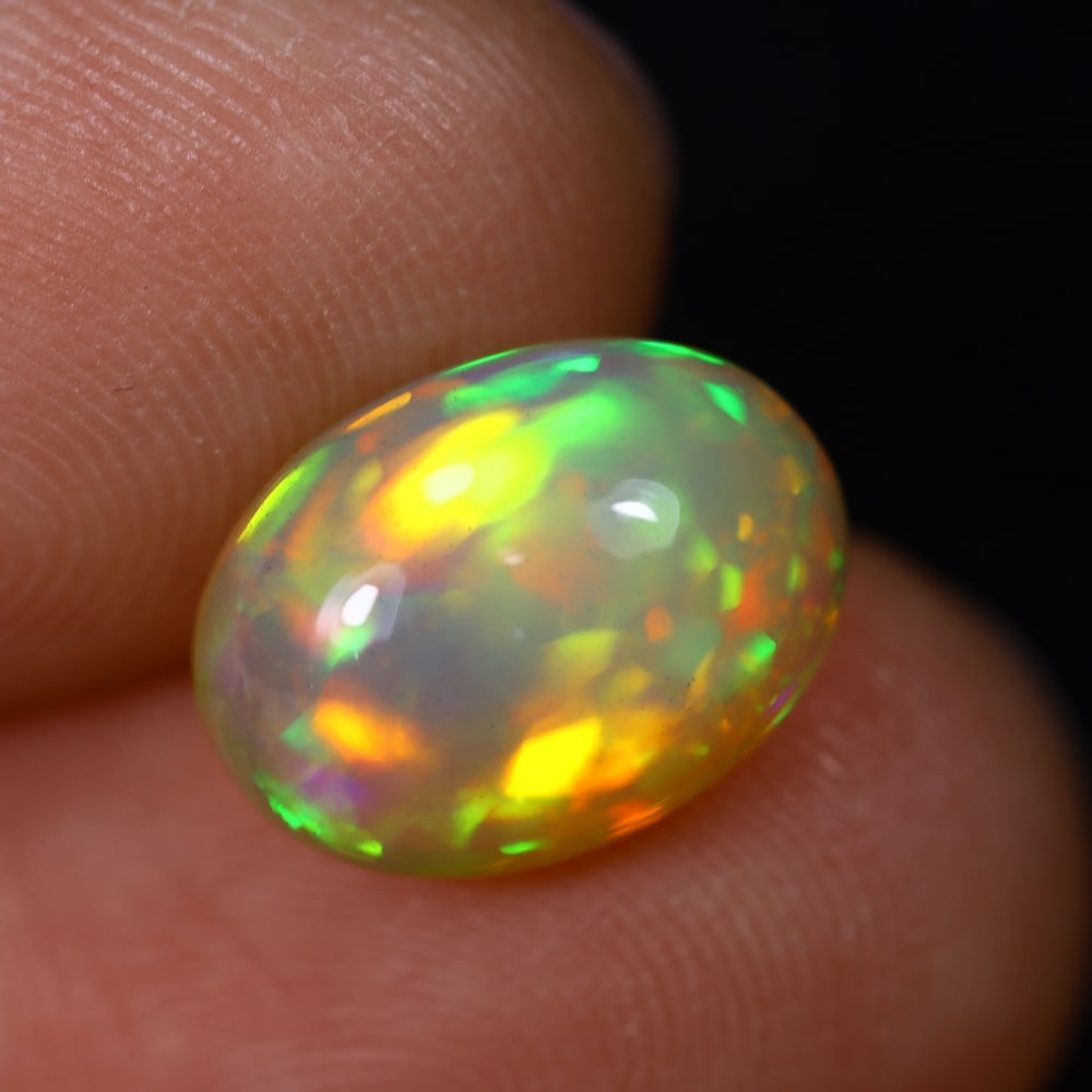 *3.15Ct Welo Opal Polished - Ethiopian Opal , 459C: Ksmith Heritage Auctioneers Subject: Natural Ethiopian Welo Opal Origin: Ethiopia Carat Weight: 3.15Ct Dimension: 11.8x8.7x6.2 mm Treatment: Natural Untreated Type: Cabochon, Polished