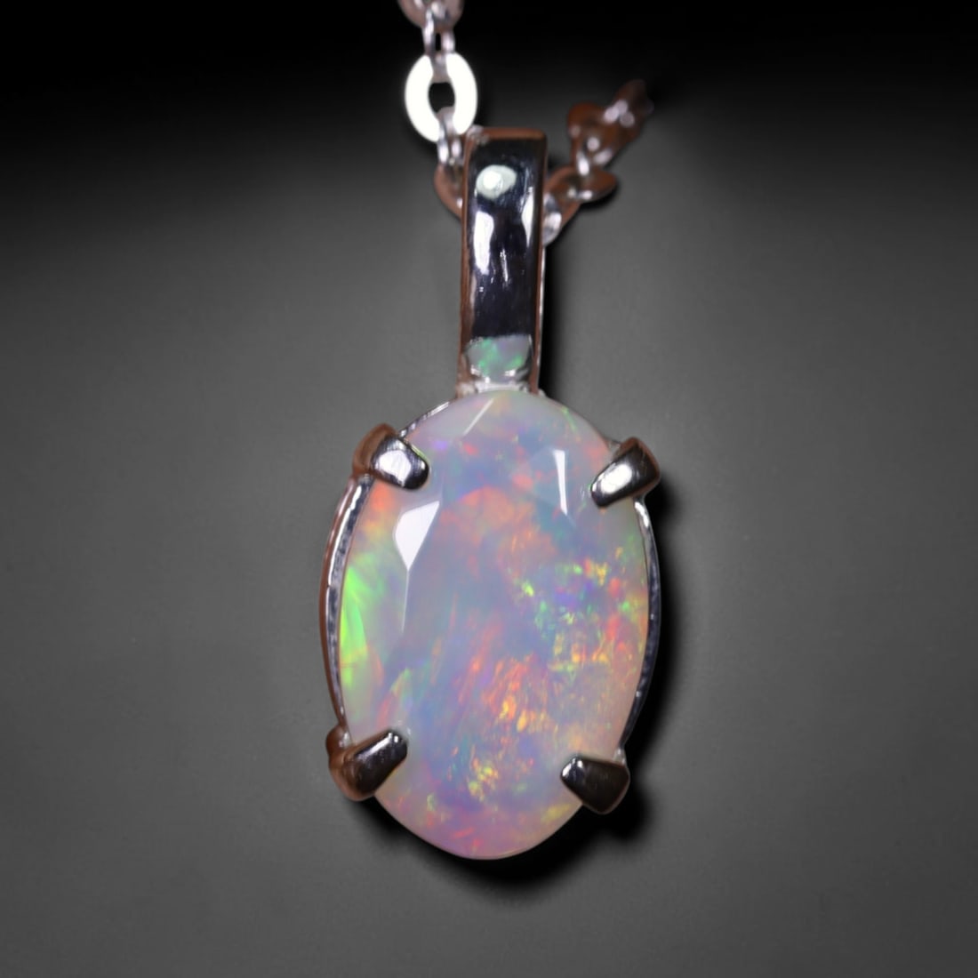 1.67g Natural Opal Stone Sterling Silver 925 Necklace (Pendant with Chain) , 562E: Ksmith Heritage Auctioneers Subject: Natural Ethiopian Opal Necklace Origin: Ethiopia Pendant Dimension : 18x6mm (included clasp) Stone Dimension: 11x8mm Treatment: Natural Untrea