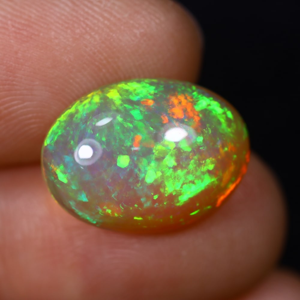*5.30Ct Welo Opal Polished - Ethiopian Opal , 401C: Ksmith Heritage Auctioneers Subject: Natural Ethiopian Welo Opal Origin: Ethiopia Carat Weight: 5.30Ct Dimension: 16.3x12x5.6 mm Treatment: Natural Untreated Type: Cabocho