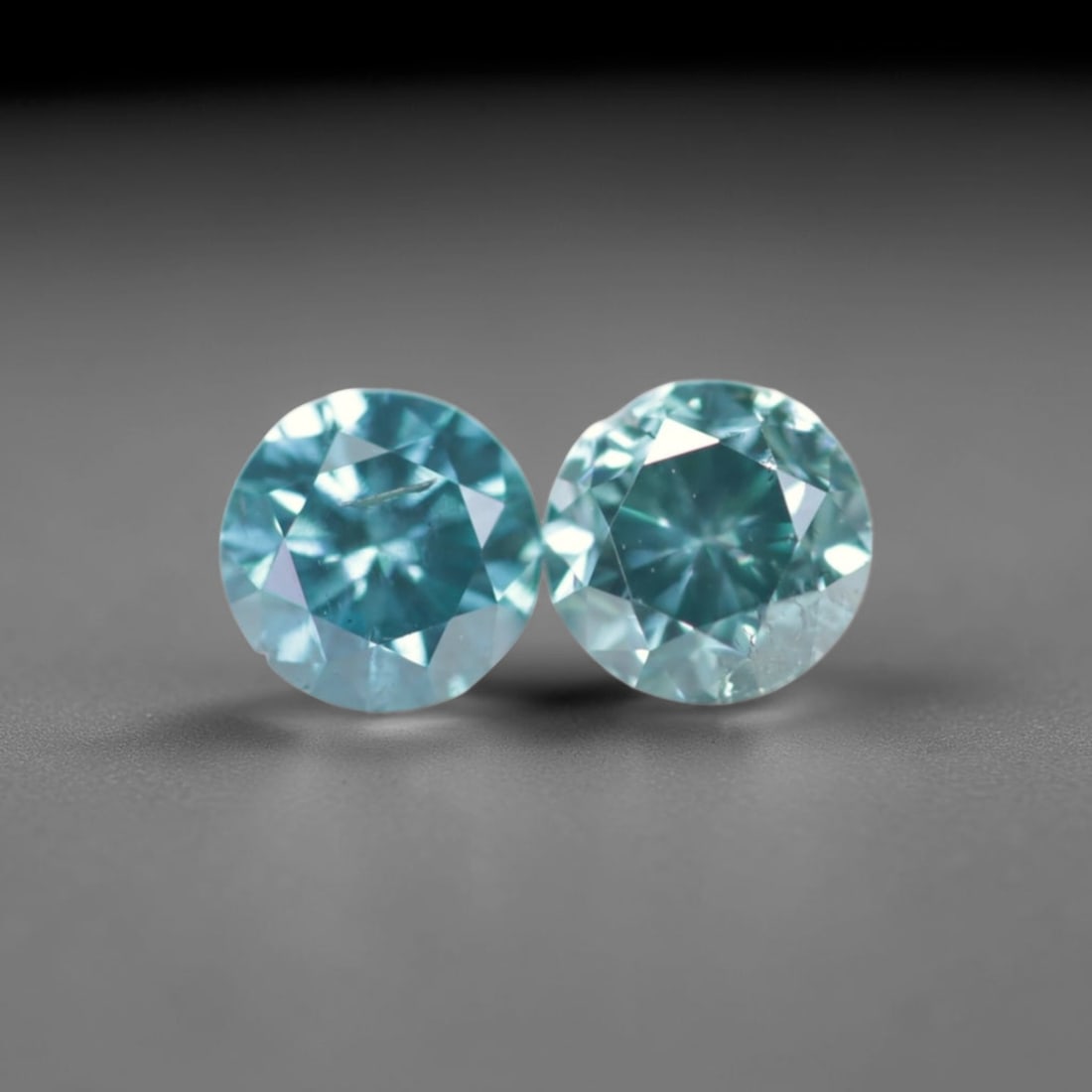 0.39Ct Peacock Diamond Pair - Polished Faceted , 647E: Ksmith Heritage Auctioneers Subject: Natural Diamond Origin: Africa Carat Weight: 0.39Ct Dimension: 3.4 x 3.4 x 2 mm Treatment: HPHT Type: Faceted, Polished