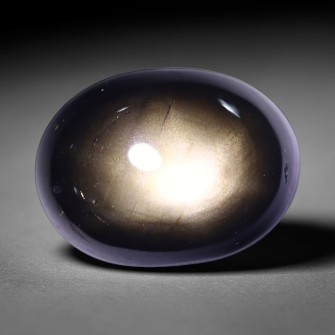 *3.95Ct 6 Rays Black Star Sapphire - Polished Cabochon, 1095B: Ksmith Heritage Auctioneers Subject: Natural 6 Rays Star Sapphire Origin: Myanmar Carat Weight: 3.95Ct Dimension: 9.7x7.3x4.5 mm Treatment: Diffusion Type: Cabochon, Polished