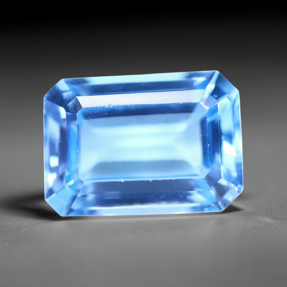 9.65 carats Natural Swiss Blue Topaz - 14.2x10.1x6.8mm , 832C: Ksmith Heritage Auctioneers Subject: Natural Topaz Treatment: Irradiated Type: Faceted, Polished