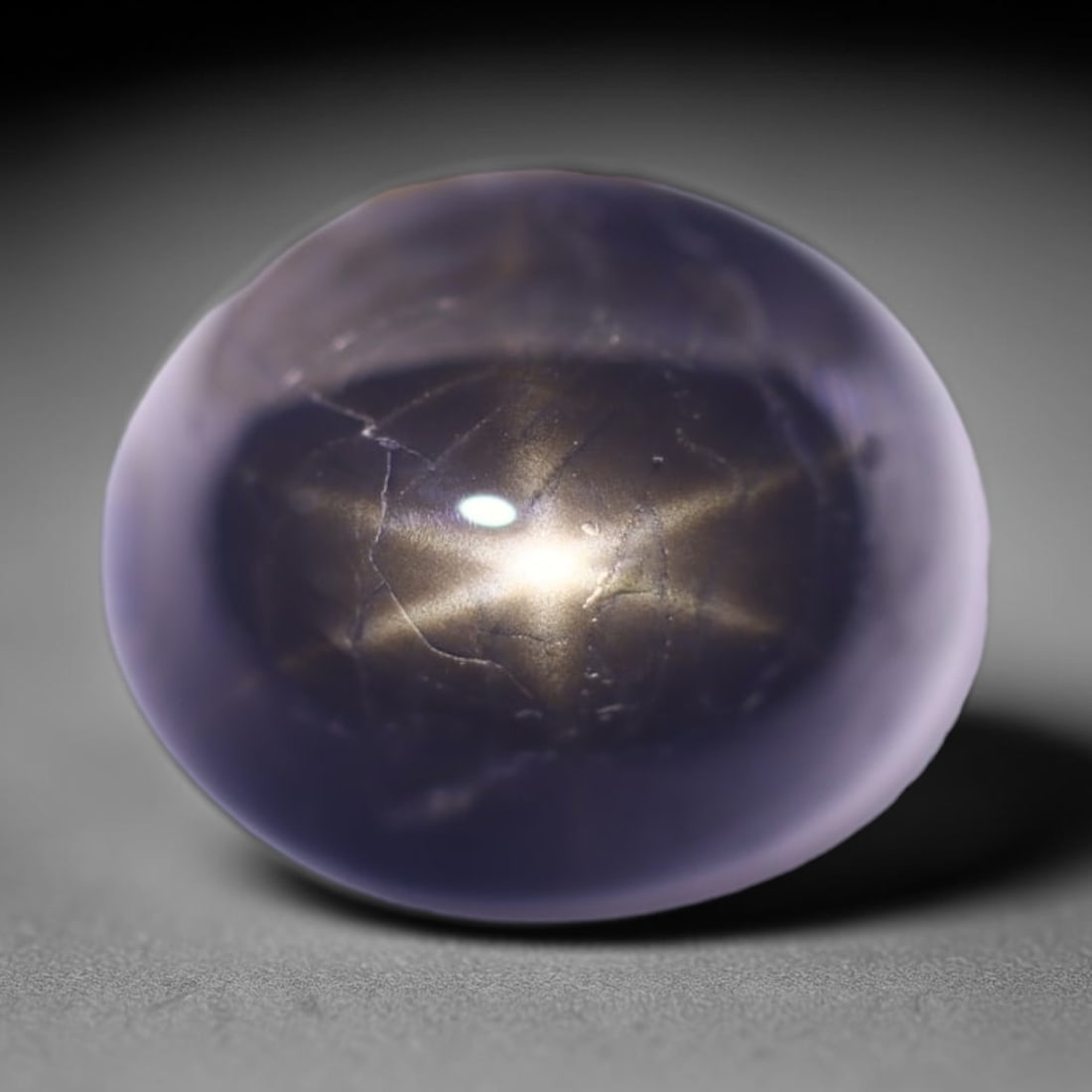 4.79cts 6 Rays Black Star Sapphire , 418E: Ksmith Heritage Auctioneers Subject: Natural 6 Rays Star Sapphire Origin: Myanmar Carat Weight: 4.79cts Dimension: 10.1x8.6x5.4 mm Treatment: Diffusion Type: Cabochon, Pol