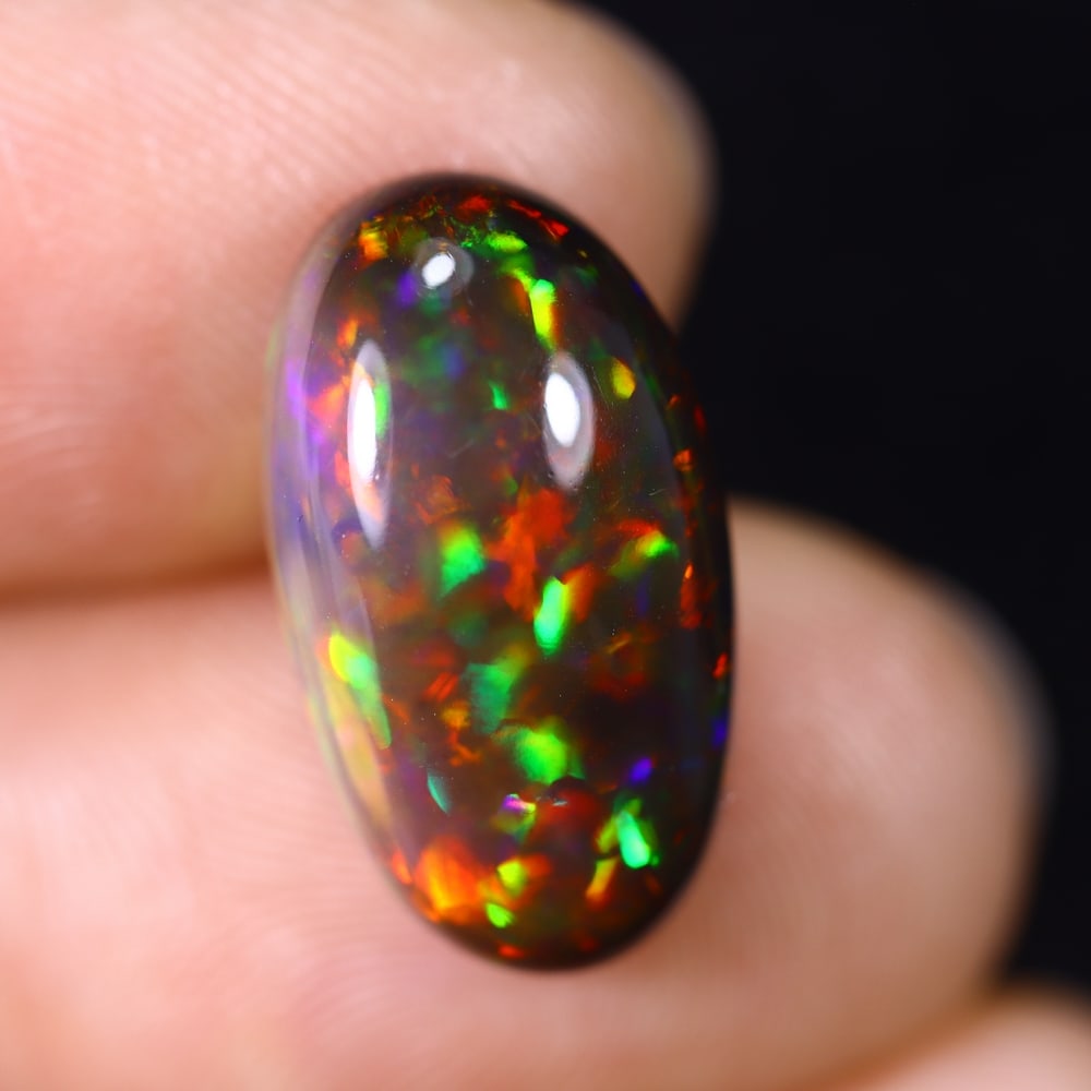 6.12Ct Natural Ethiopian Black Opal - 17.4x9.7x6.4 mm , 619C: Ksmith Heritage Auctioneers Subject: Natural Ethiopian Welo Opal Origin: Ethiopia Treatment: Smoked