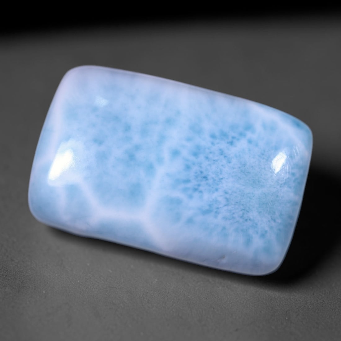 *17.78cts Natural Larimar - Polished Cabochon, 1126B: Ksmith Heritage Auctioneers Subject: Natural Larimar Origin: Dominican Republic Carat Weight: 17.78 cts Dimension: 21.4x14x5.5 mm Type: Cabochon, Polished