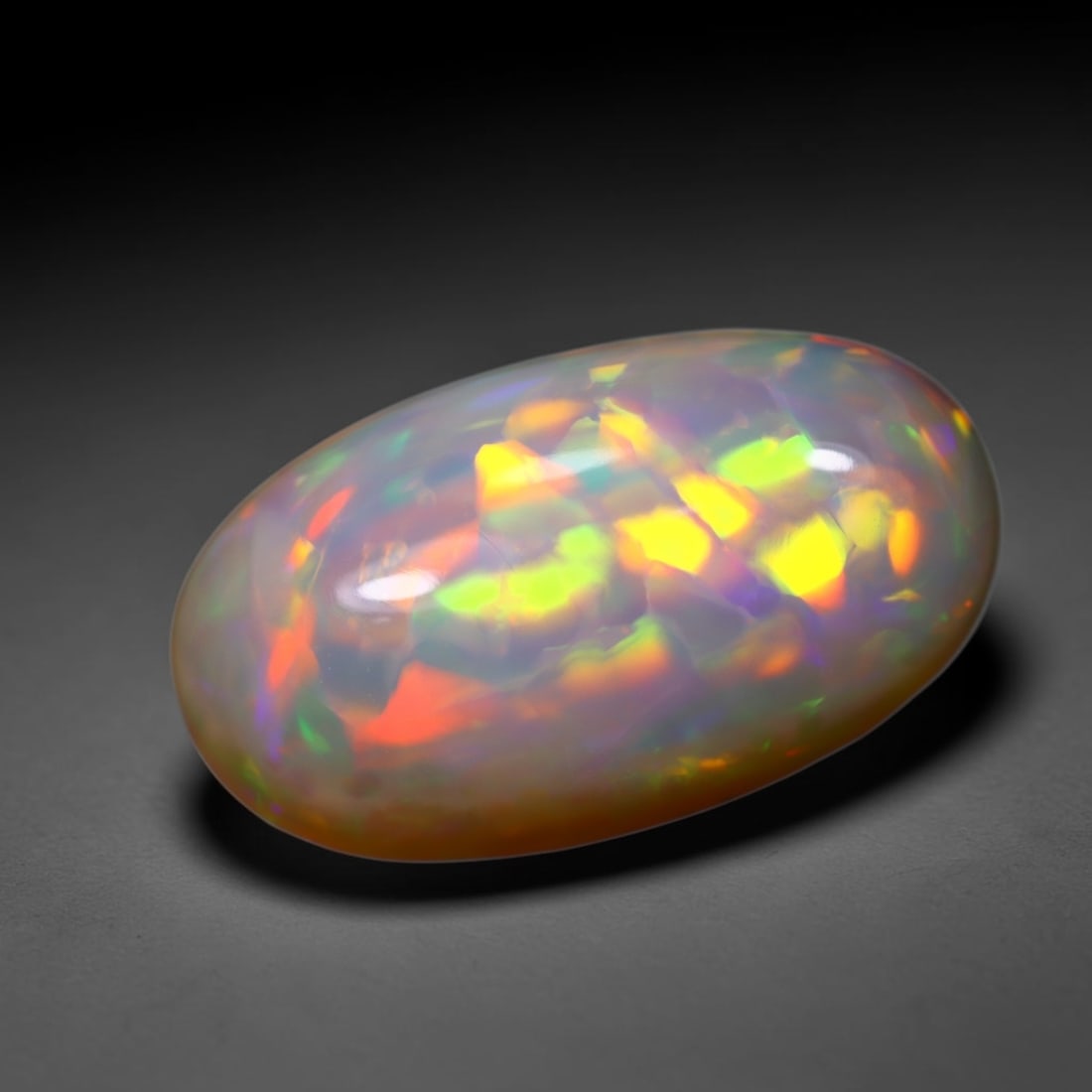 *4.20Ct Welo Opal Polished - Ethiopian Opal , 399C: Ksmith Heritage Auctioneers Subject: Natural Ethiopian Welo Opal Origin: Ethiopia Carat Weight: 4.20Ct Dimension: 15.8x8.9x6.1 mm Treatment: Natural Untreated Type: Cabochon, Polished