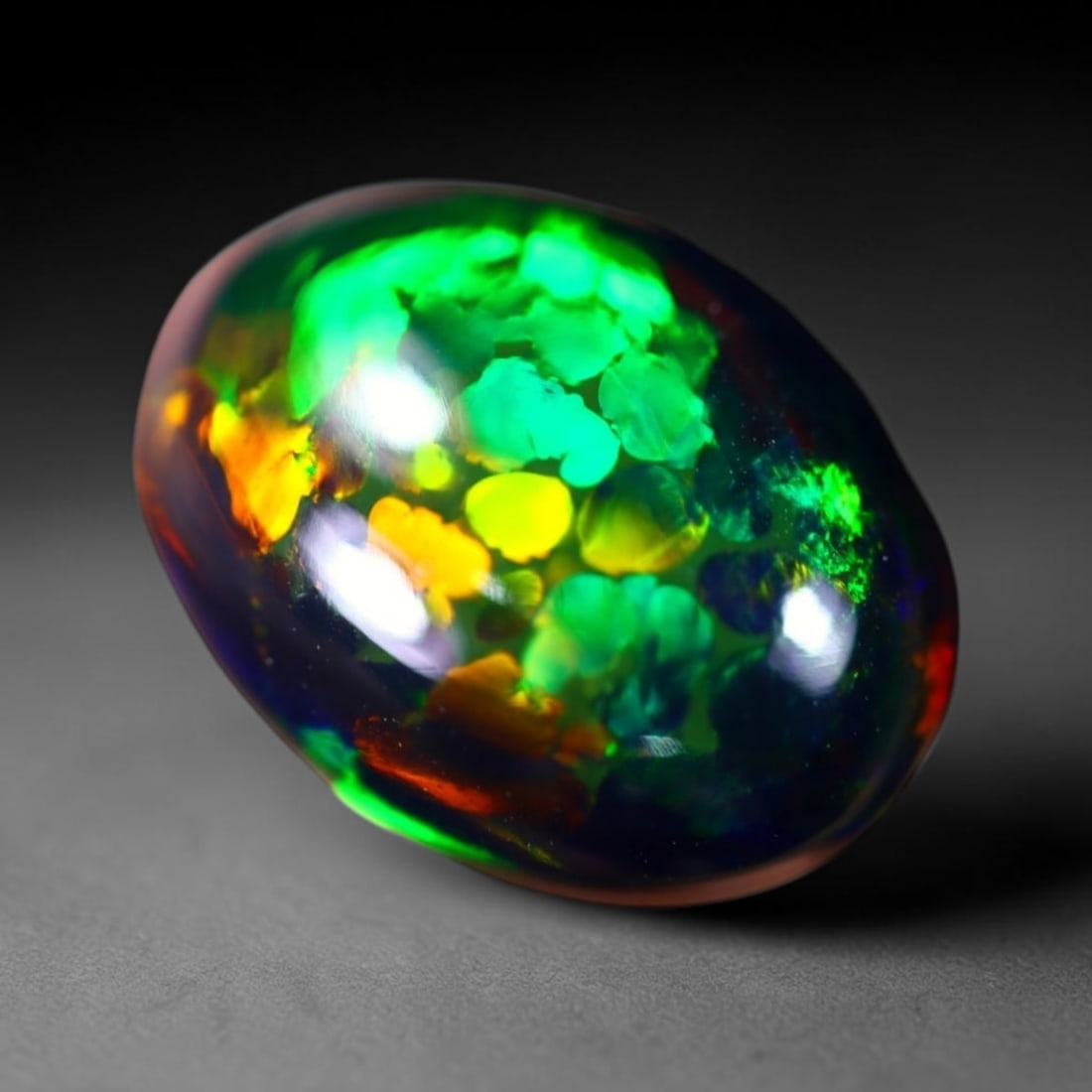 *4.47Ct Welo Black Opal Polished - Ethiopian Opal - Oval Cabochon , 116E: Ksmith Heritage Auctioneers Subject: Natural Ethiopian Welo Black Opal Origin: Ethiopia Carat Weight: 4.47Ct Dimension: 14.5 x 10.6 x 5.7 mm Treatment: Smoked Shape: Oval<