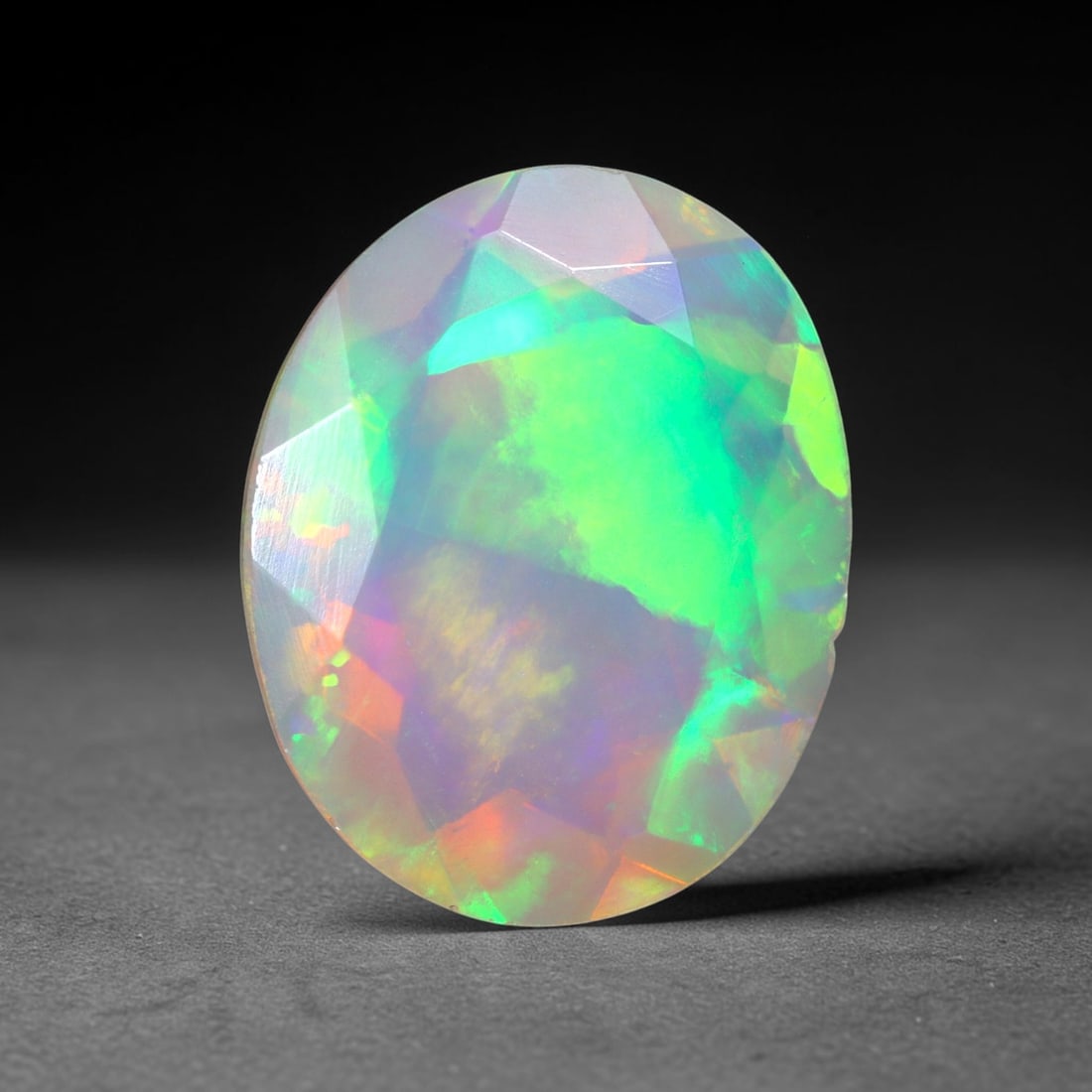 1.88Ct Natural Ethiopian Opal, Faceted Cut - 11.0x8.8x5.0 mm , 657C: Ksmith Heritage Auctioneers Subject: Natural Ethiopian Welo Opal Origin: Ethiopia Treatment: Unheated