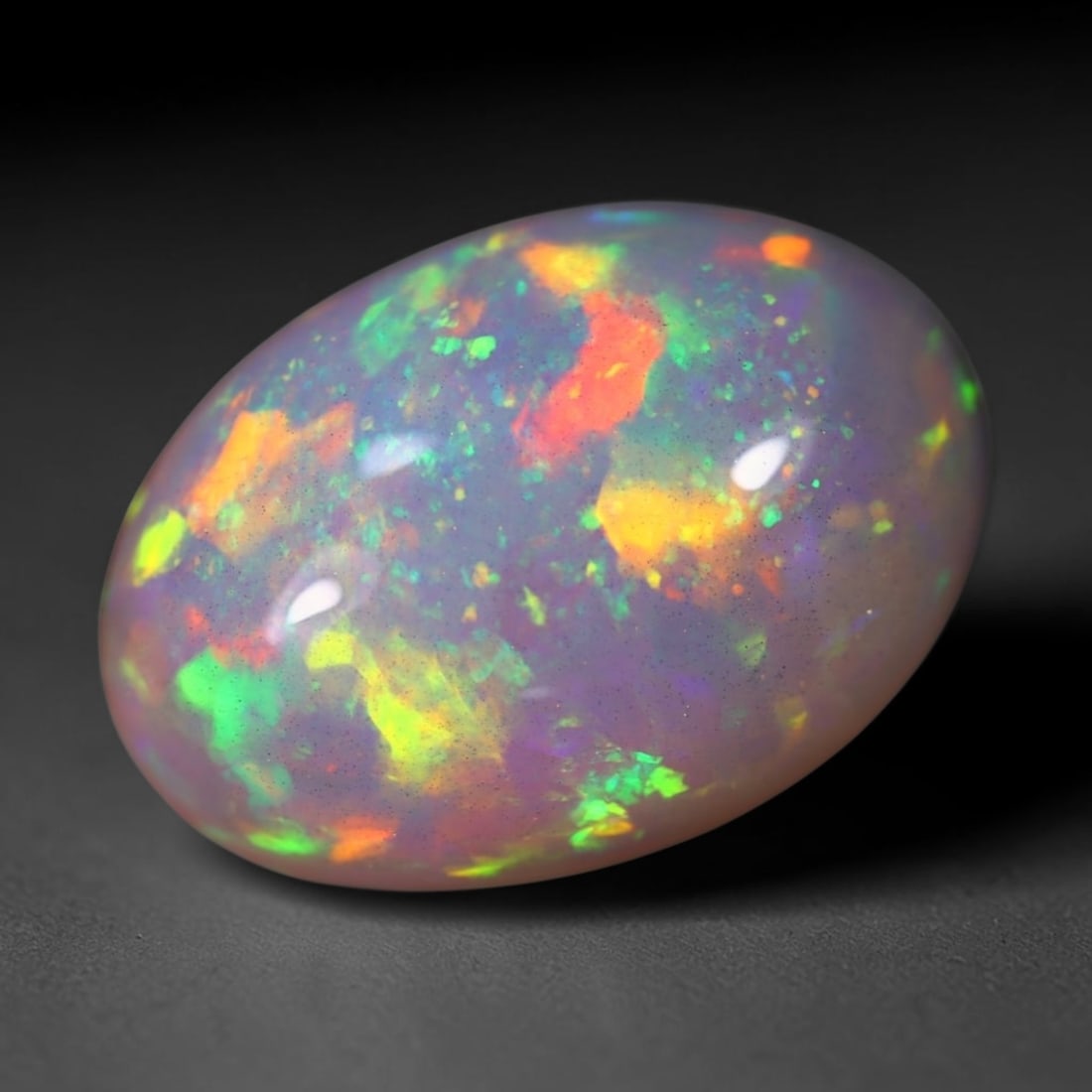 *7.53Ct Welo Opal Polished - Ethiopian Opal , 505E: Ksmith Heritage Auctioneers Subject: Natural Ethiopian Welo Opal Origin: Ethiopia Carat Weight: 7.53Ct Dimension: 17.3x11.9x6.9 mm Treatment: Natural Untreated Type: Caboc