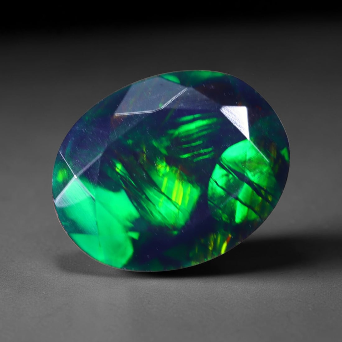 1.52 Ct Black Opal Faceted Cut Polished - Ethiopian Opal - 10x8mm , 930C: Ksmith Heritage Auctioneers Subject: Natural Ethiopian Welo Black Opal Origin: Ethiopia Treatment: Smoked