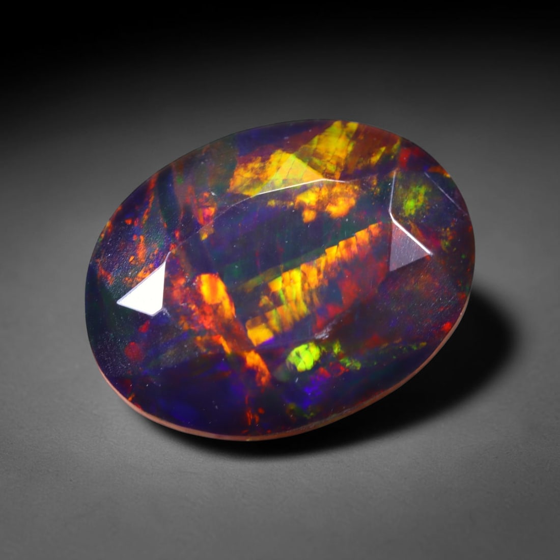 1.58 Ct Black Opal Faceted Cut Polished - Ethiopian Opal - 10x7mm , 955C: Ksmith Heritage Auctioneers Subject: Natural Ethiopian Welo Black Opal Origin: Ethiopia Treatment: Smoked