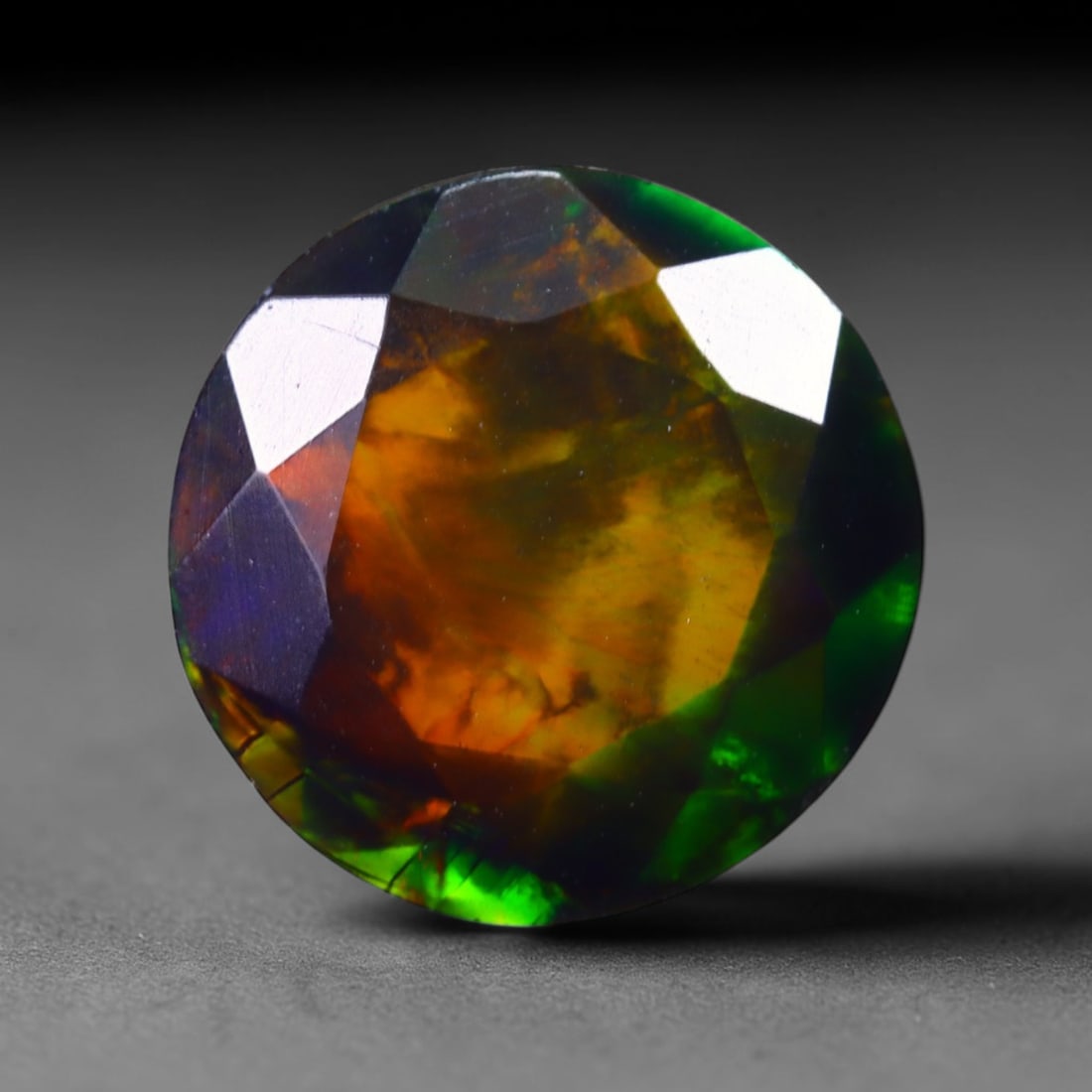 1.47 Ct Black Opal Faceted Cut Polished - Ethiopian Opal - 8x8mm , 914C: Ksmith Heritage Auctioneers Subject: Natural Ethiopian Welo Black Opal Origin: Ethiopia Treatment: Smoked