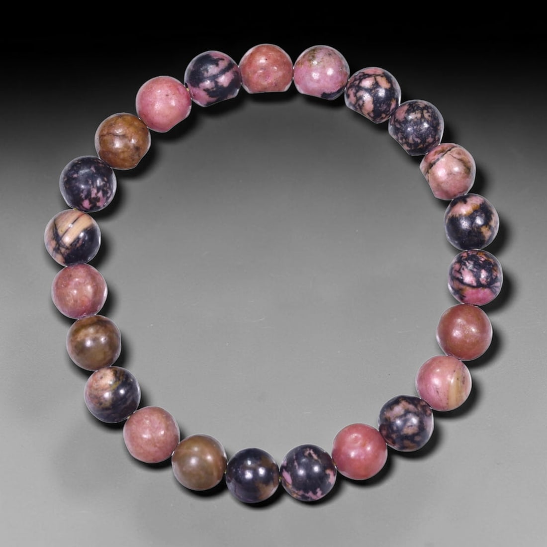 23.51g Rhodonite Bracelet - Polished Beads , 1162E: Ksmith Heritage Auctioneers Subject: Natural Rhodonite Carat Weight: 23.51g