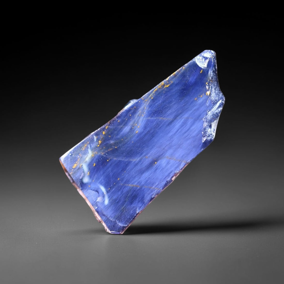 44.86Ct Pietersite Slab - Gemstone Crystal - Freeform Slice, 488B: Ksmith Heritage Auctioneers Subject: Natural Pietersite Origin: Namibia, South Africa Carat Weight: 44.86Ct Dimension: 43.9 x 22.5 x 5.5 mm Treatment: Natural Untreated Shape: