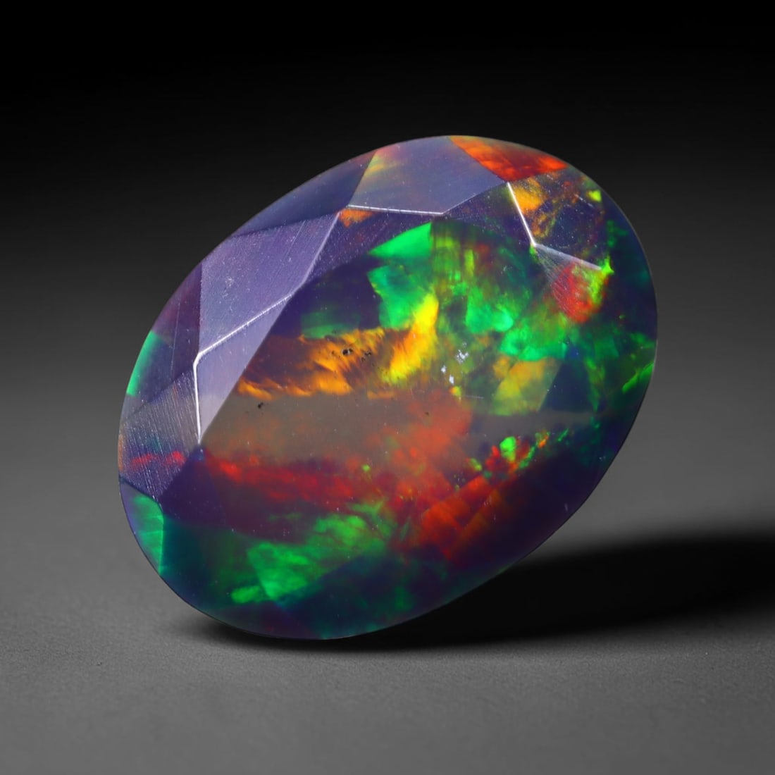 1.62 Ct Black Opal Faceted Cut Polished - Ethiopian Opal - 10x7mm , 959C: Ksmith Heritage Auctioneers Subject: Natural Ethiopian Welo Black Opal Origin: Ethiopia Treatment: Smoked