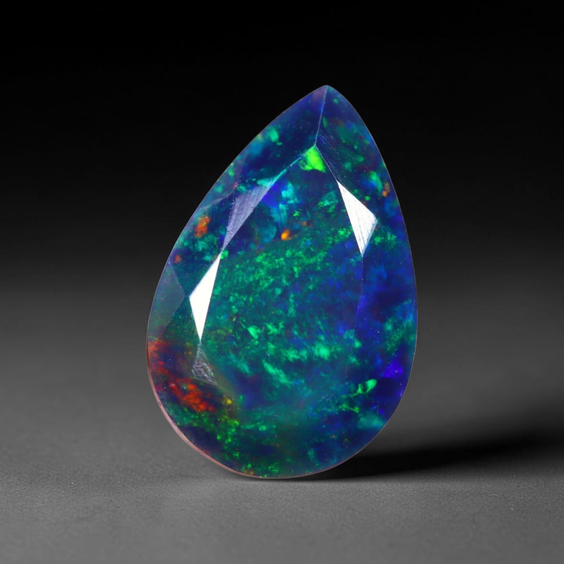 1.30 Ct Black Opal Faceted Cut Polished - Ethiopian Opal - 10x7mm , 957C: Ksmith Heritage Auctioneers Subject: Natural Ethiopian Welo Black Opal Origin: Ethiopia Treatment: Smoked