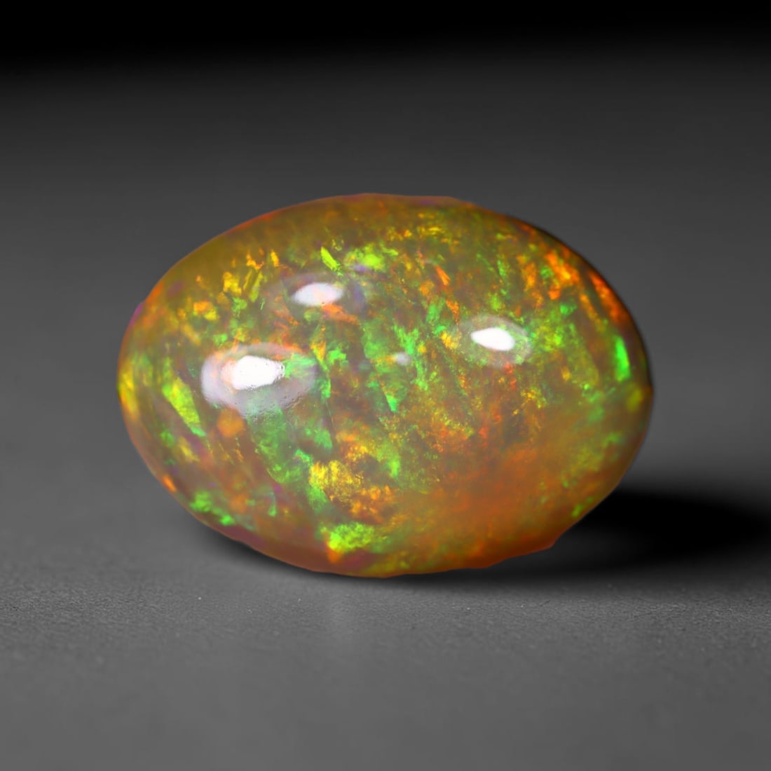 *12.11Ct Welo Opal Polished - Ethiopian Opal , 449C: Ksmith Heritage Auctioneers Subject: Natural Ethiopian Welo Opal Origin: Ethiopia Carat Weight: 12.11Ct Dimension: 20.1x15.1x7.8mm Treatment: Natural Untreated Type: Caboc