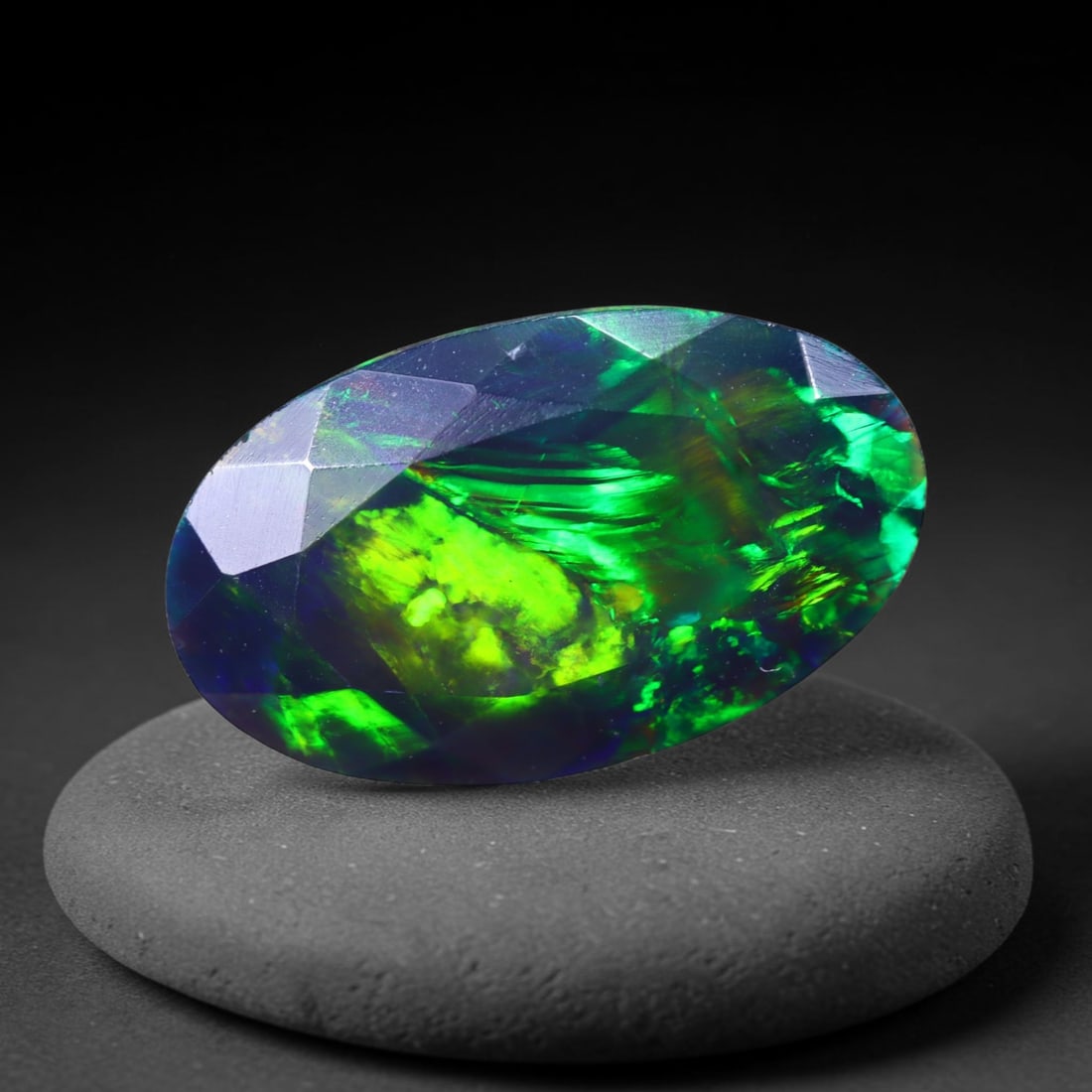 1.60 Ct Black Opal Faceted Cut Polished - Ethiopian Opal - 12x7mm , 940C: Ksmith Heritage Auctioneers Subject: Natural Ethiopian Welo Black Opal Origin: Ethiopia Treatment: Smoked
