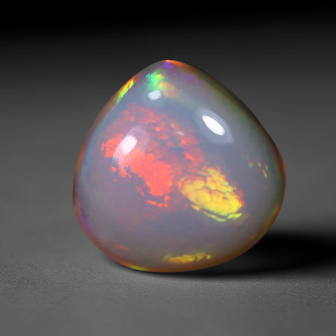 *3.95Ct Welo Opal Polished - Ethiopian Opal , 458C: Ksmith Heritage Auctioneers Subject: Natural Ethiopian Welo Opal Origin: Ethiopia Carat Weight: 3.95Ct Dimension: 12.6x12.5x5.5 mm Treatment: Natural Untreated Type: Caboc