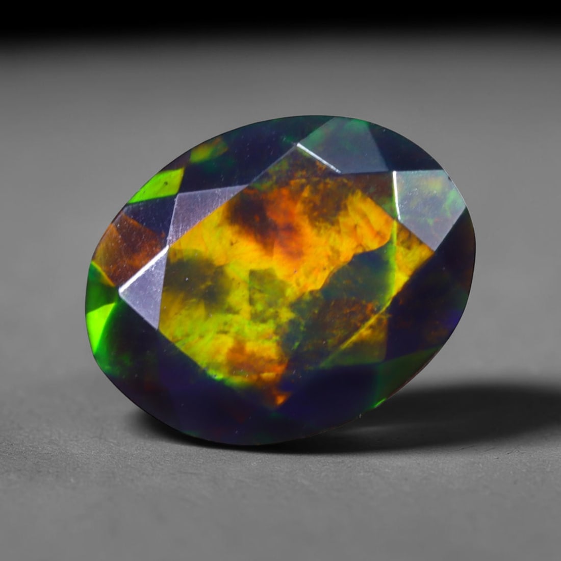 1.04 Ct Black Opal Faceted Cut Polished - Ethiopian Opal - 9x7mm , 932C: Ksmith Heritage Auctioneers Subject: Natural Ethiopian Welo Black Opal Origin: Ethiopia Treatment: Smoked