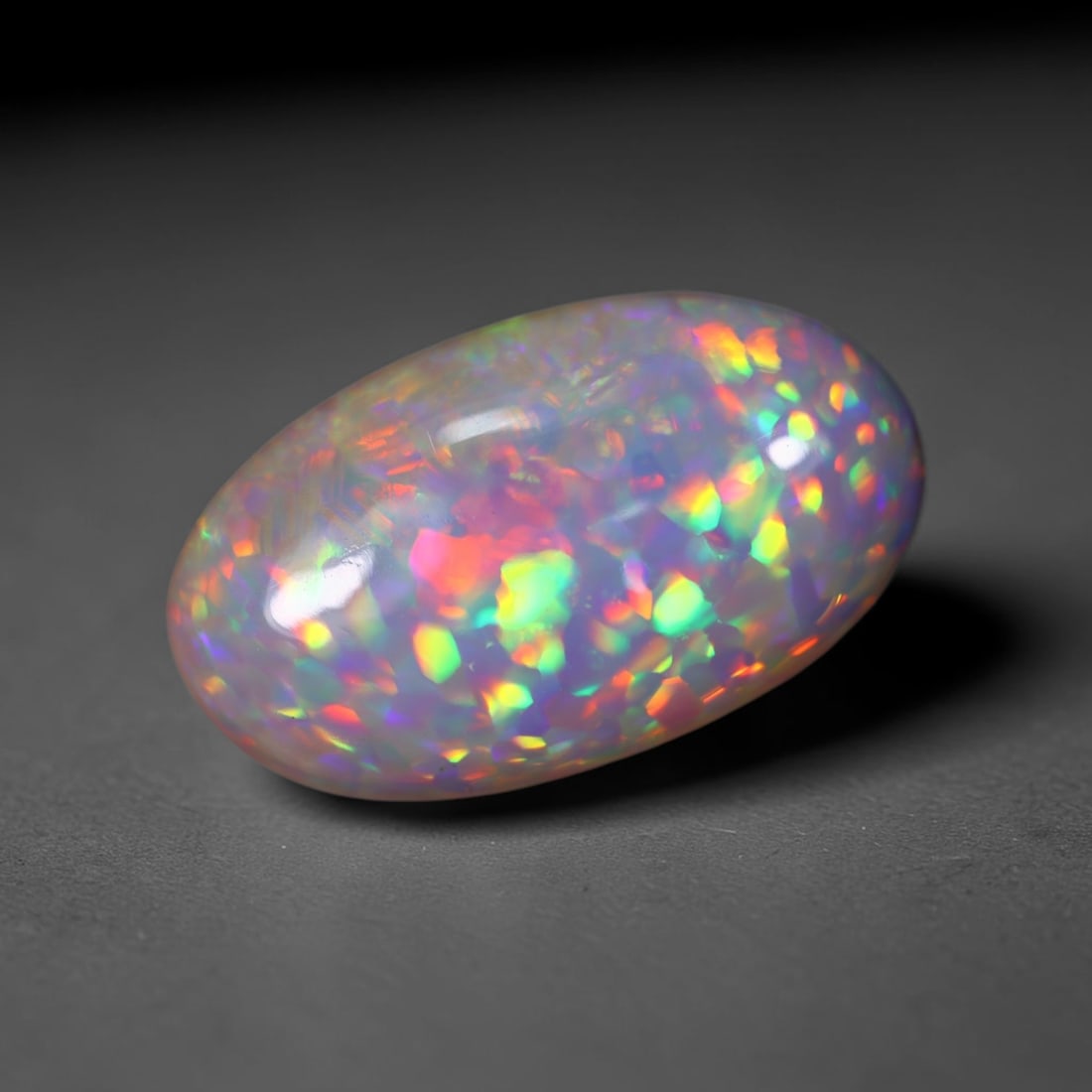 *5.31Ct Welo Opal Polished - Ethiopian Opal , 410C: Ksmith Heritage Auctioneers Subject: Natural Ethiopian Welo Opal Origin: Ethiopia Carat Weight: 5.31Ct Dimension: 18x10.6x5.4 mm Treatment: Natural Untreated Type: Cabocho