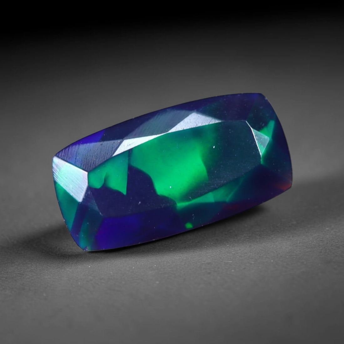 1.72 Ct Black Opal Faceted Cut Polished - Ethiopian Opal - 12x6mm , 938C: Ksmith Heritage Auctioneers Subject: Natural Ethiopian Welo Black Opal Origin: Ethiopia Treatment: Smoked