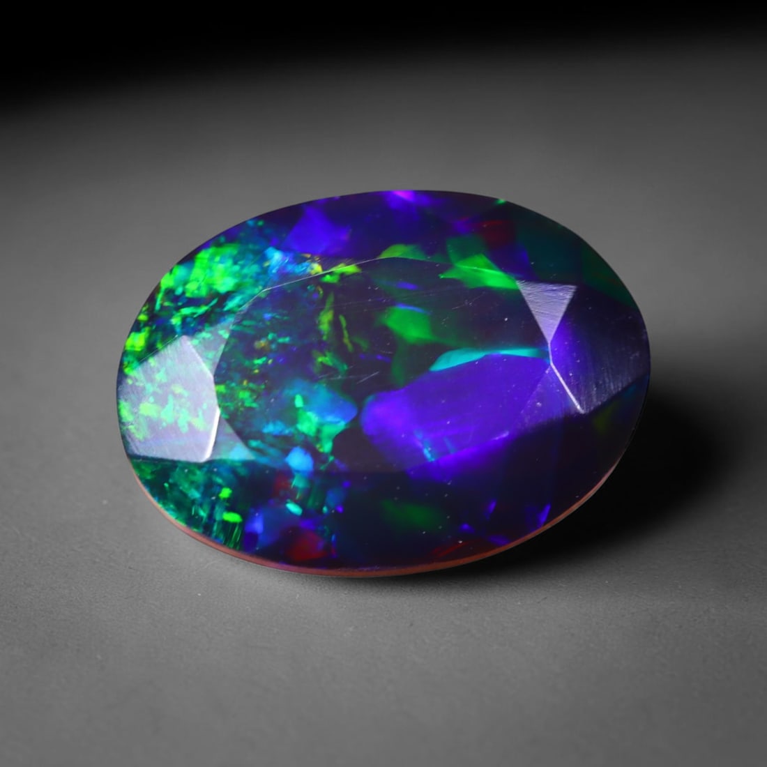 1.54 Ct Black Opal Faceted Cut Polished - Ethiopian Opal - 8x7mm , 945C: Ksmith Heritage Auctioneers Subject: Natural Ethiopian Welo Black Opal Origin: Ethiopia Treatment: Smoked