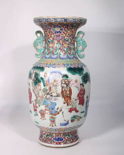 A Large Chinese Famille Rose Vase With Two Handles, early 19th Century: The vase is 17.1 inches tall and 8.5 inches wide.