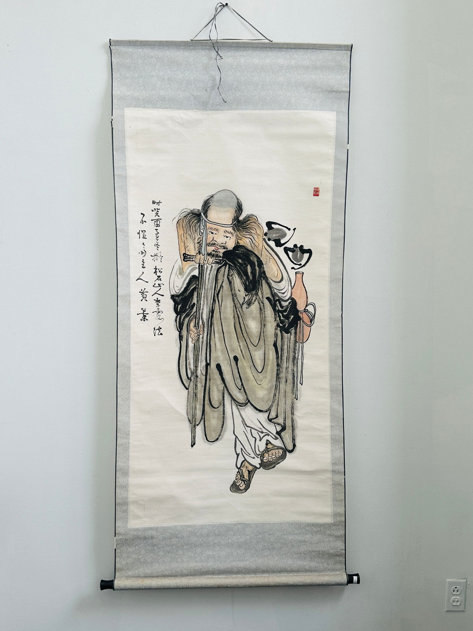 A Chinese Scroll Painting by Tieguai Li: The height is 70 inches and the width is 30.5 inches.