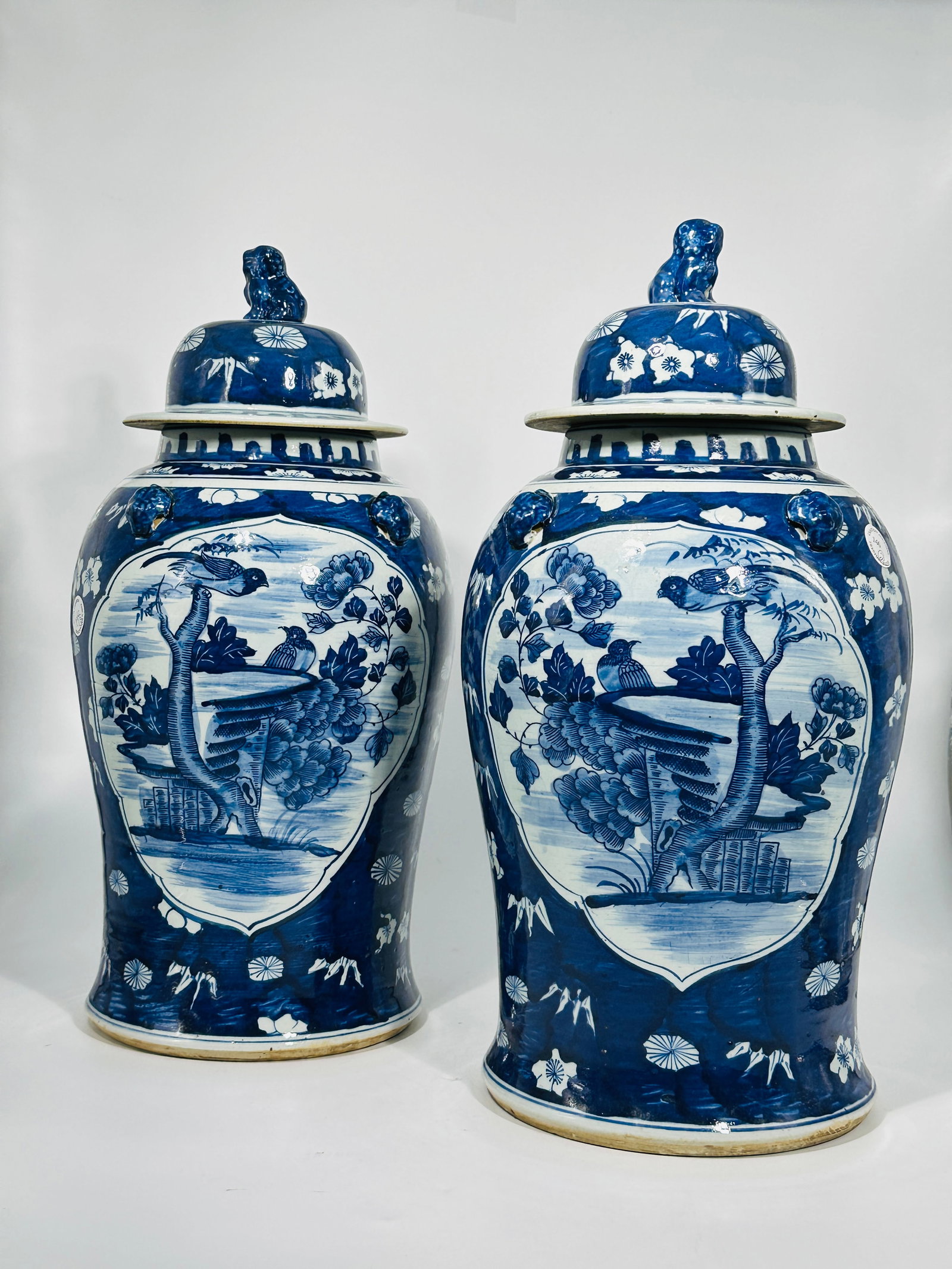 A Pair Of Chinese Blue And White Lamps: The height of both is 20 inches and the width is 10 inches. From a collector in Chicago.
