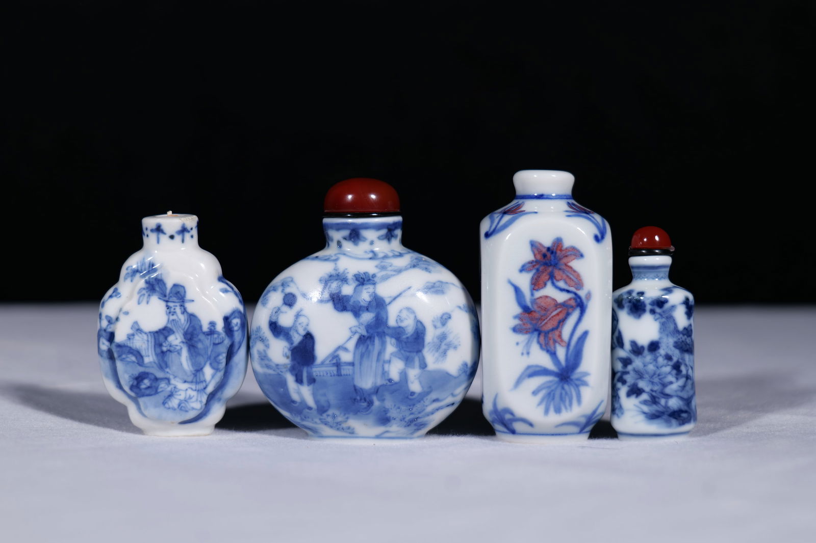 A Group of Four Porcelain Snuff Bottles (1 of 14)